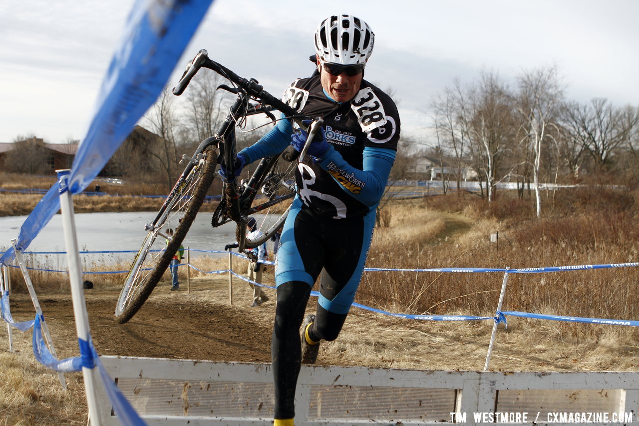 The Downhill-Off Camber-Barriers Created A Lot of Different Bike Carry Methods © Cyclocross Magazine